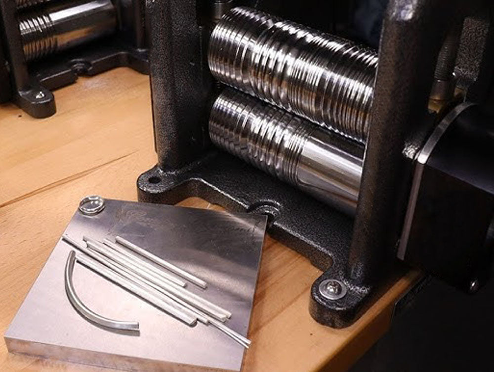 Jewelry rolling mill with flat and grooved rollers for shaping and texturing metal sheet and wire