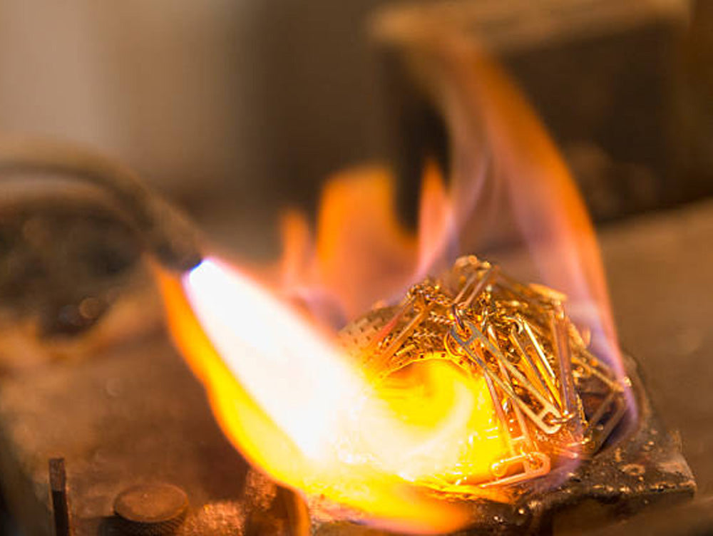 Jewelry melting techniques showing crucible torch and electric furnace tools for gold and silver melting