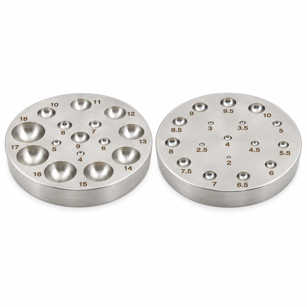Two sides of the Tooltos round jewelry dapping die, showing different numbered cavity sizes on each face.
