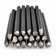20 iron metal stamping punches arranged on a white background