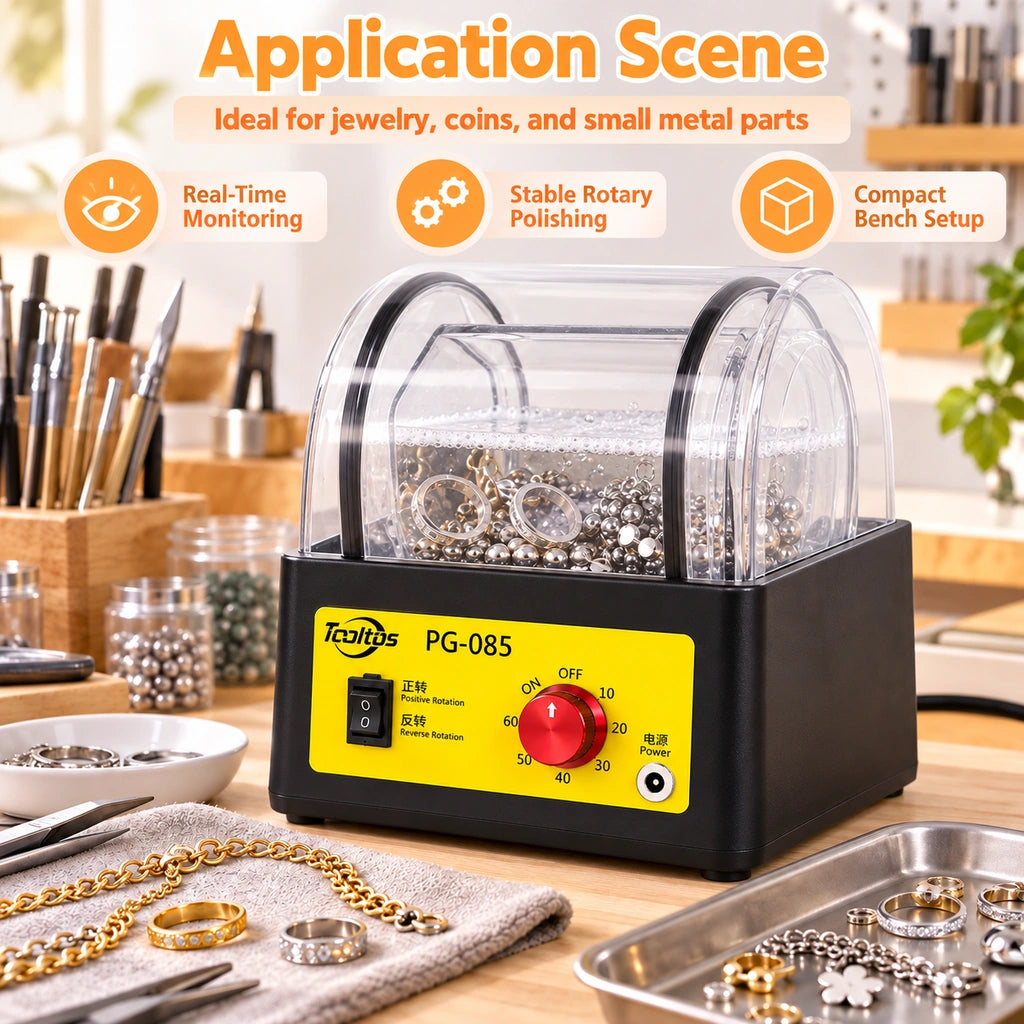 Transparent polishing barrel holding jewelry and polishing media on a Tooltos PG085 rotary tumbler at a jewelry workbench.