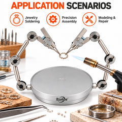 Dual arm helping hands holding a twisted metal ring beside a soldering torch on a jewelry workbench