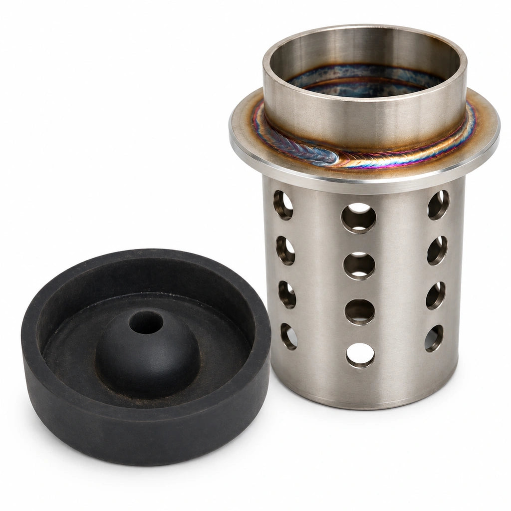 Black rubber casting flask base with a central cone and opening beside a perforated flanged metal casting flask

