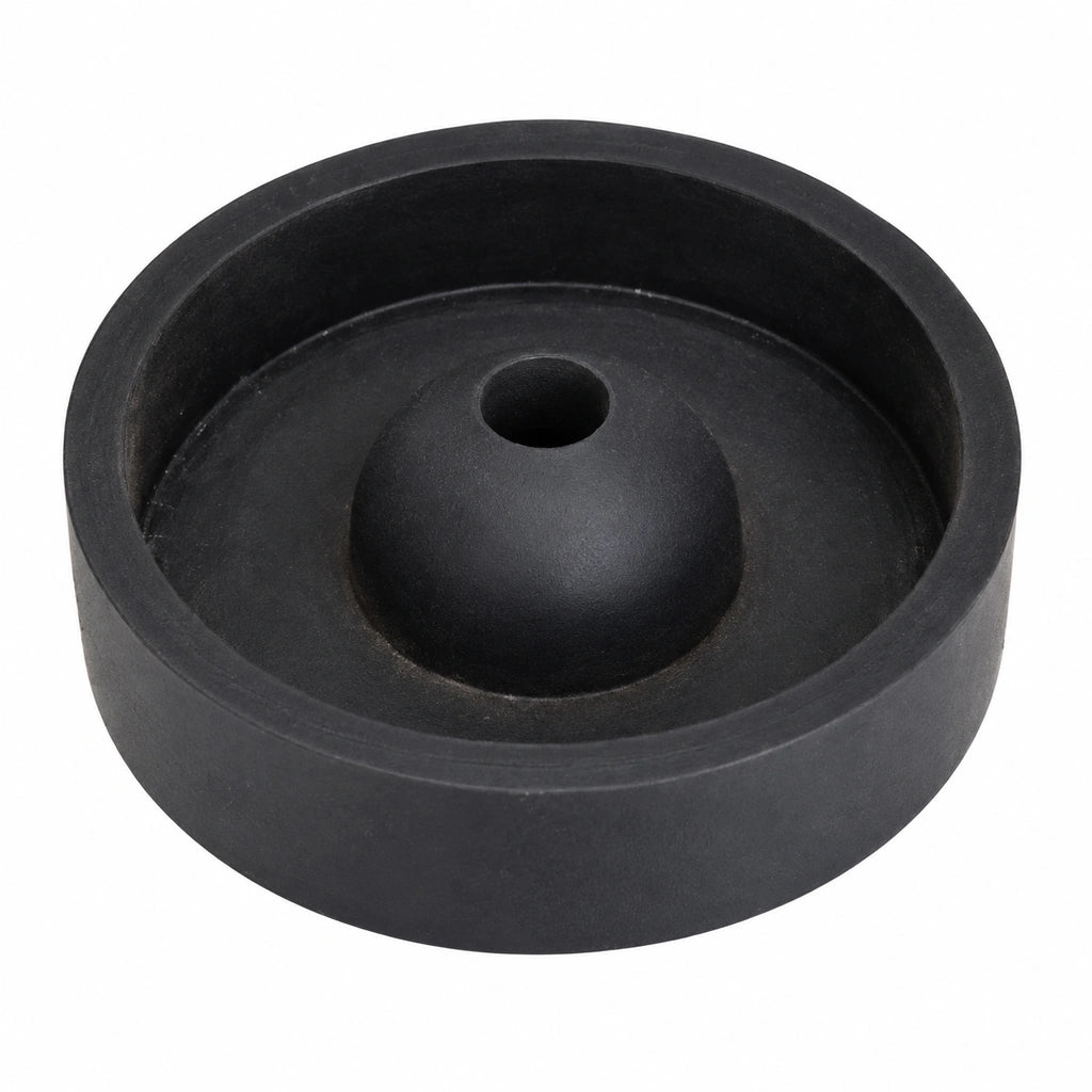 Black rubber base for a jewelry casting flask with a raised outer rim and central cone with an opening
